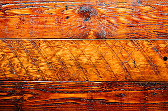 Close-up of rustic wooden planks with rich grain texture