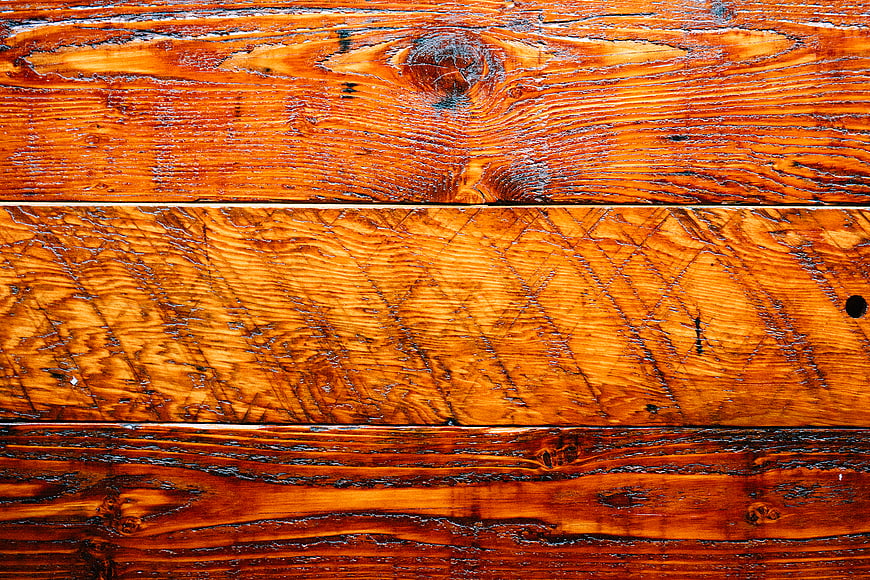 Close-up of rustic wooden planks with rich grain texture