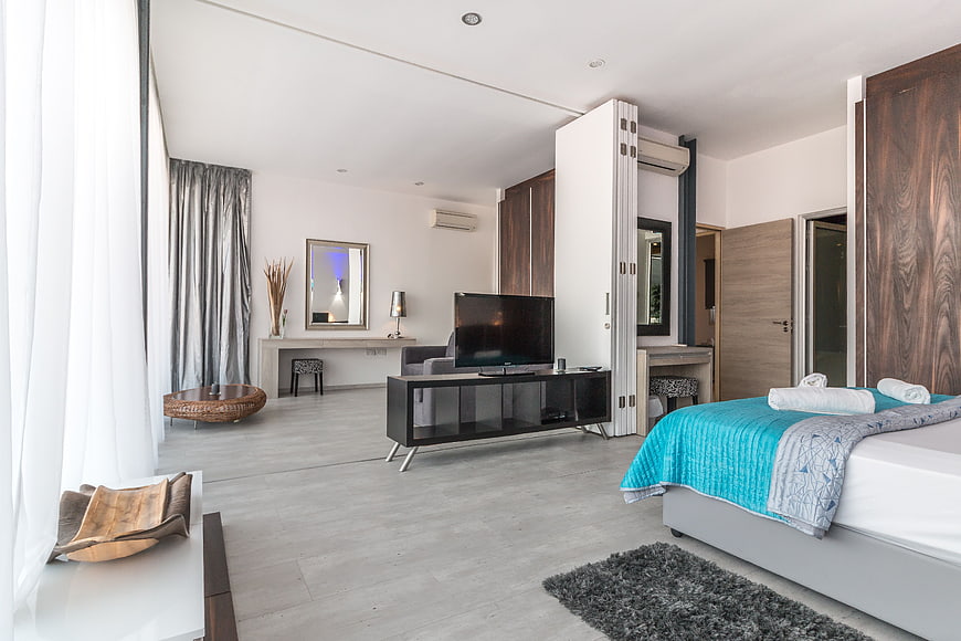 Modern Hotel Suite Interior with Bedroom and Living Area