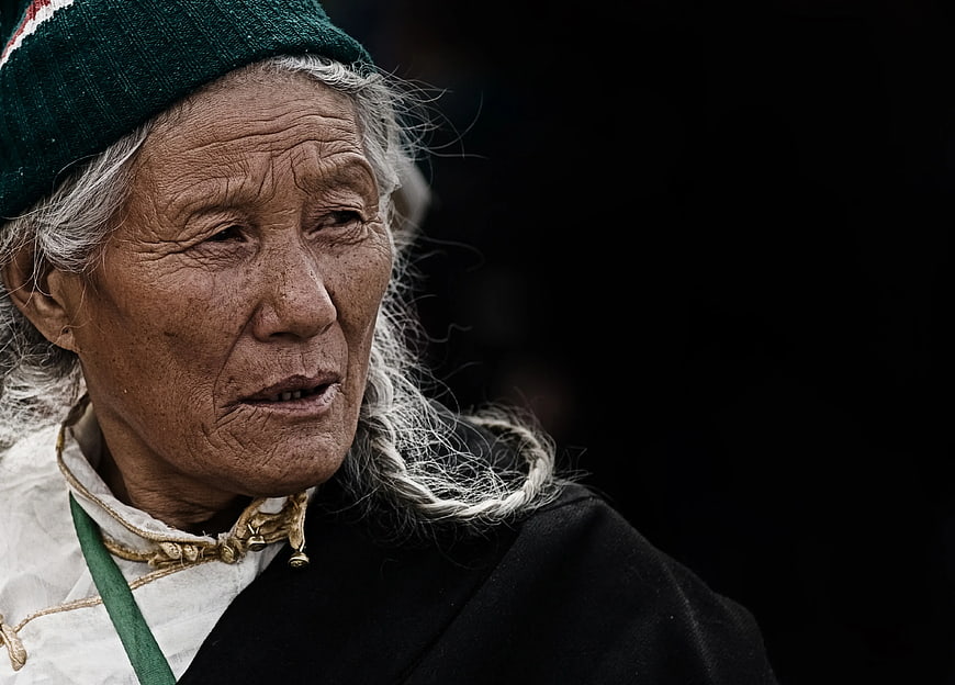Portrait of Elderly Woman in Traditional Attire