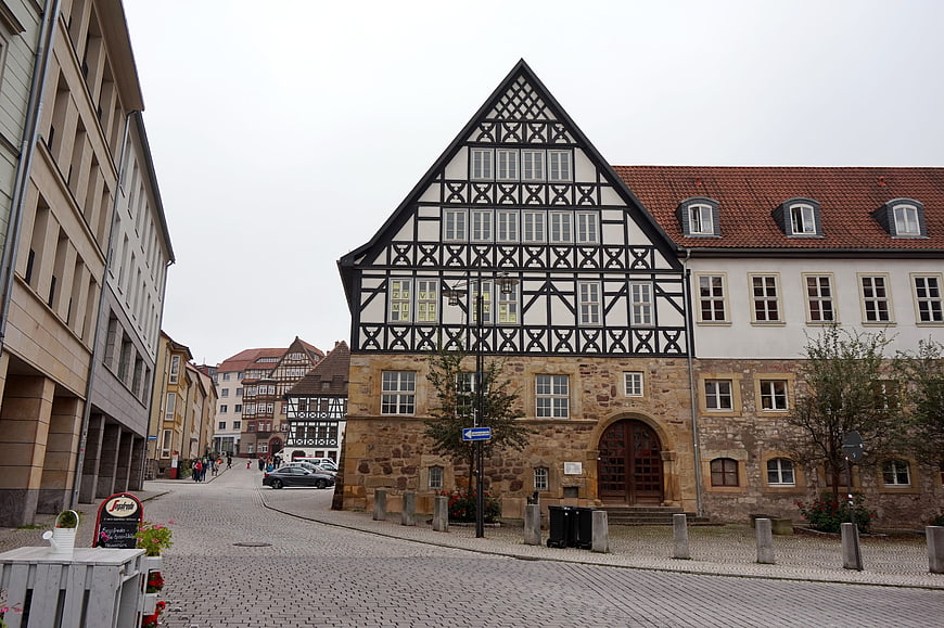 Historic Half-Timbered Building on Cobblestone Street in Eisenach, Germany