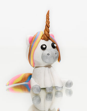 Handmade Clay Unicorn Figurine with Rainbow Mane