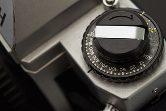 Close-up of vintage camera ISO dial and metal body