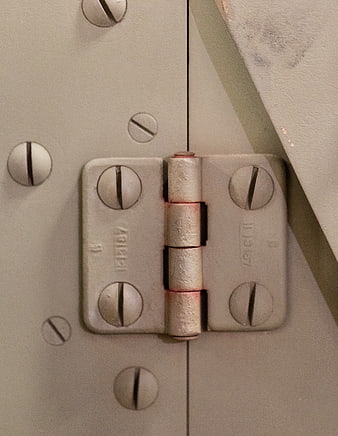 Close-up of Rusted Metal Hinge on Industrial Door