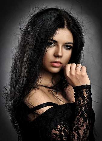 Dramatic Studio Portrait of Young Woman in Black Lace