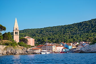 Veli Lošinj coastal town with church tower and harbor