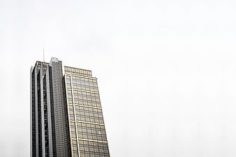 Modern Skyscraper Against White Sky