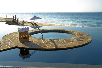 Luxury Resort Infinity Pool With Ocean View And Stone Spa