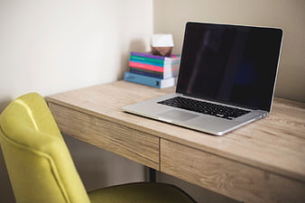 Modern Workspace with Laptop on Wooden Desk
