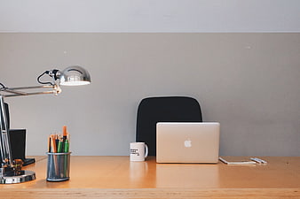 Minimalist Workspace with Laptop and Desk Lamp