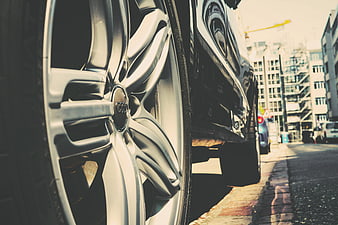 Close-up of Audi car wheel on city street