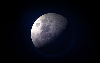 Detailed Crescent Moon with Craters Against Dark Blue Space Background