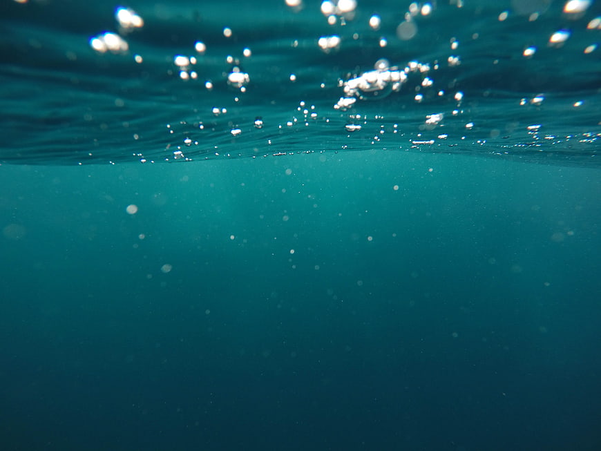 Underwater Ocean Surface View With Bubbles And Light