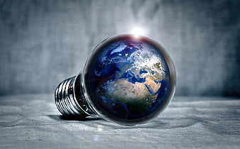 Lightbulb with Earth Inside Symbolizing Global Energy Innovation
