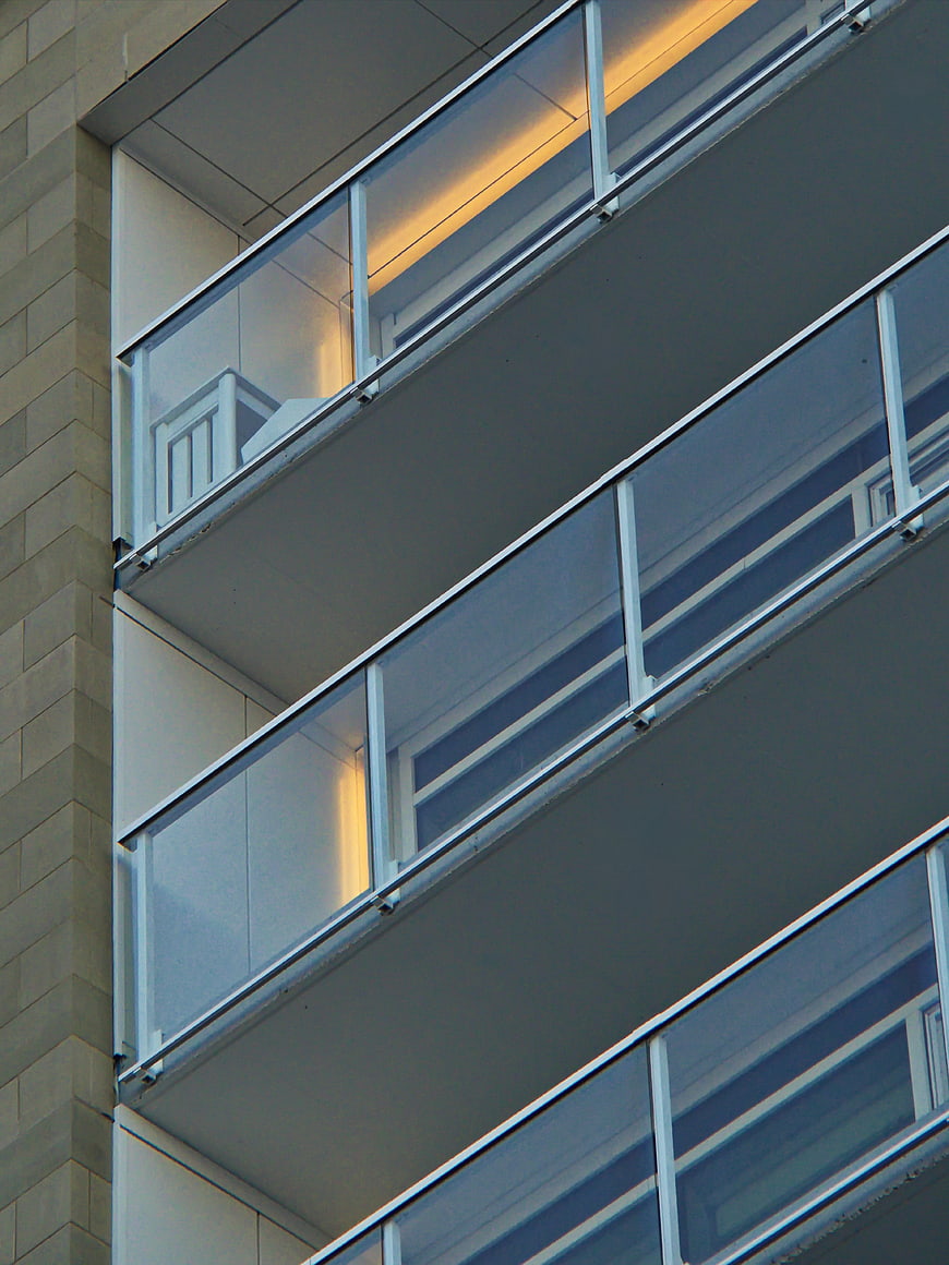 Modern Apartment Building Balconies with Glass Railings