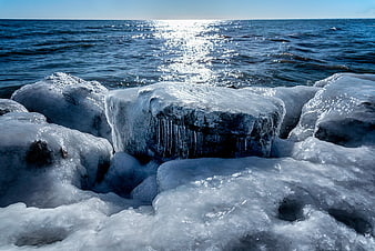 Frozen Rocks and Icy Shoreline by the Ocean