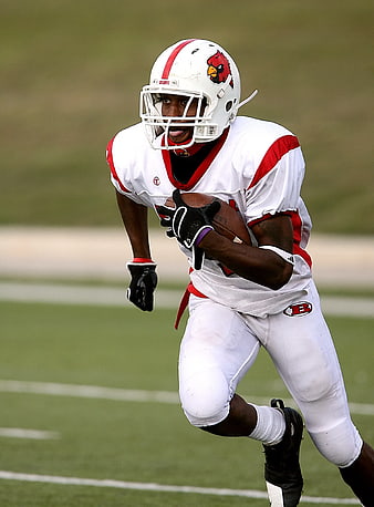 American Football Player Running with Ball on Field