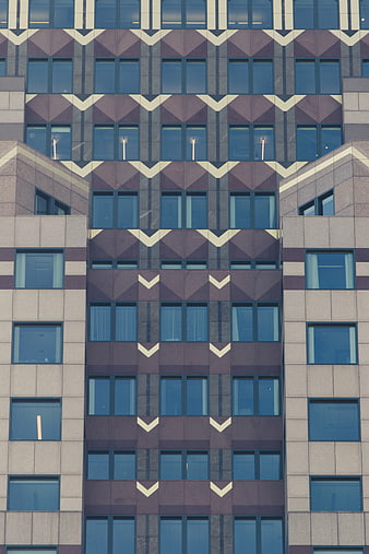 Modern Building Facade with Geometric Chevron Pattern