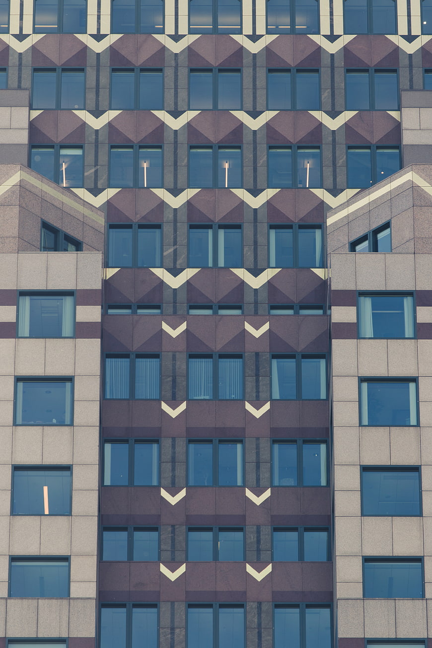 Modern Building Facade with Geometric Chevron Pattern