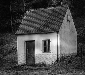 Rustic Black and White Photo of Small Rural House