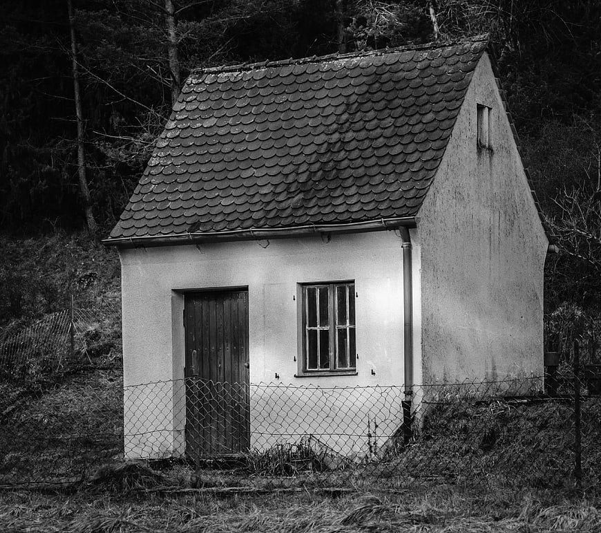 Rustic Black and White Photo of Small Rural House