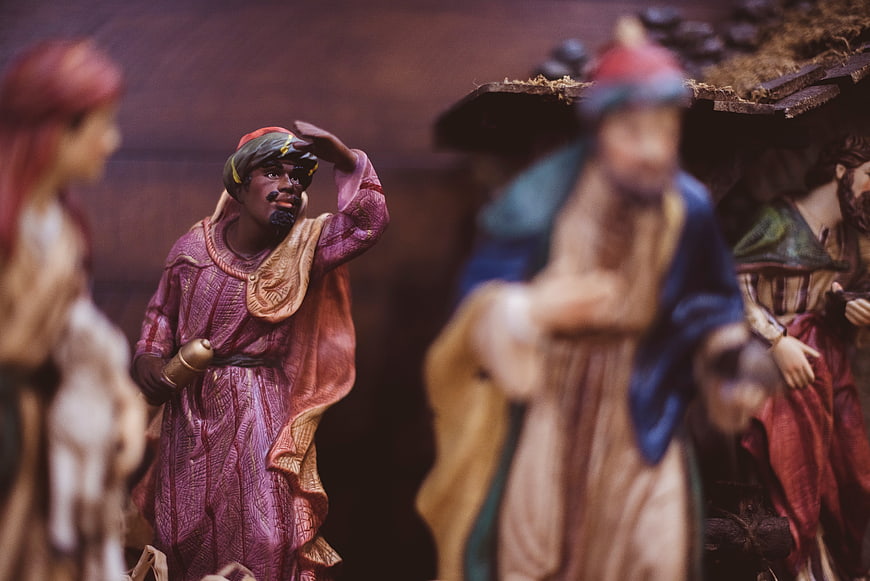 Close-up of a Wise Man figurine in a nativity scene