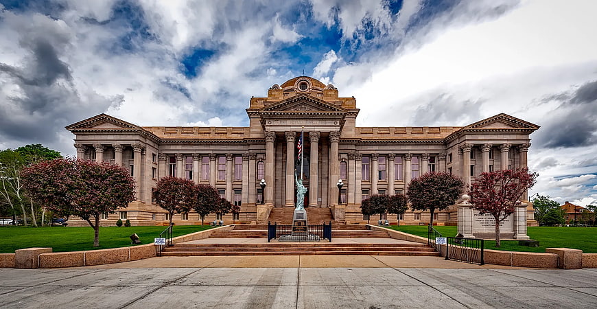 Grand Neoclassical Government Building with Columns and Statue