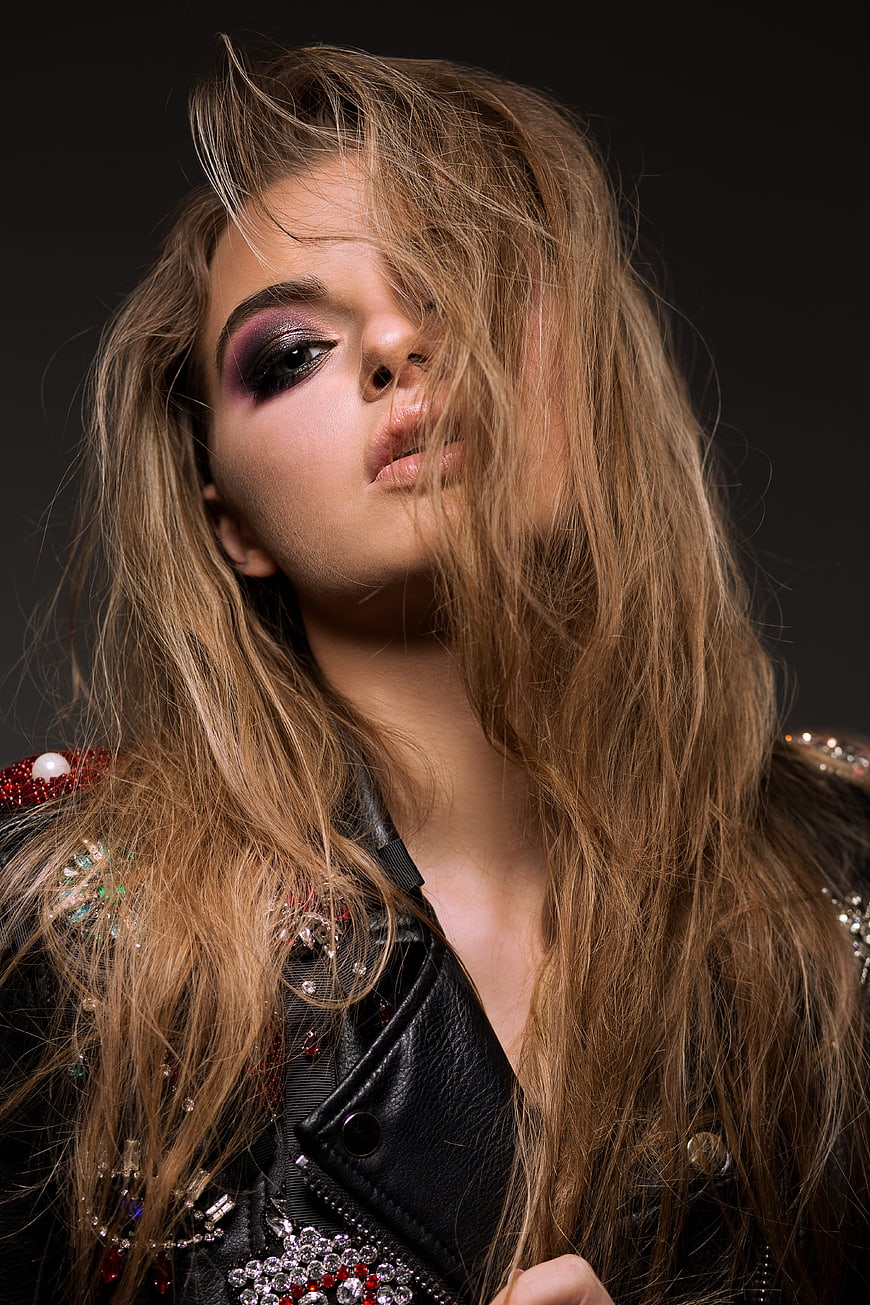 Dramatic Fashion Portrait of Woman in Embellished Leather Jacket