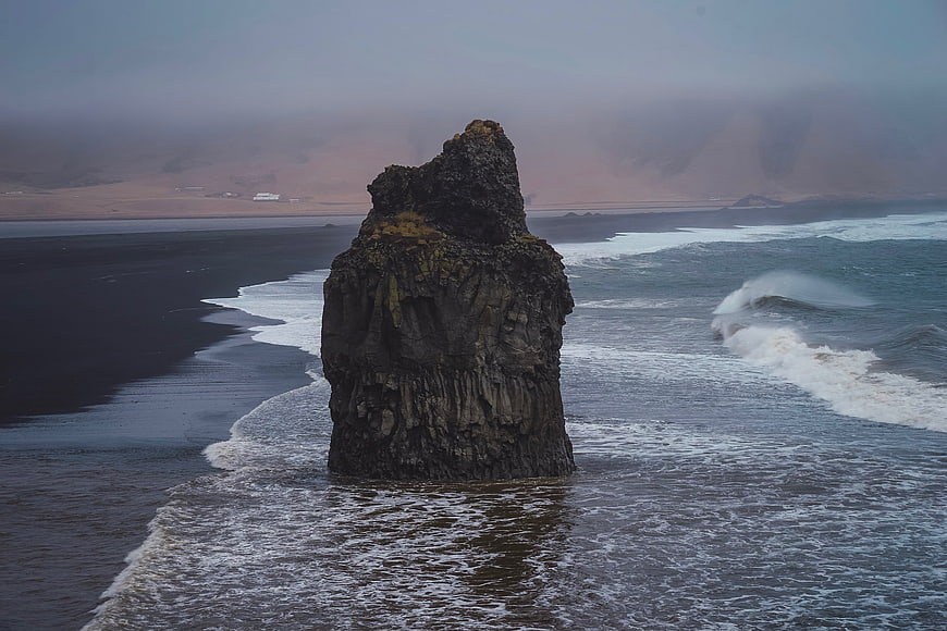 Dramatic Sea Stack on Black Sand Beach in Iceland