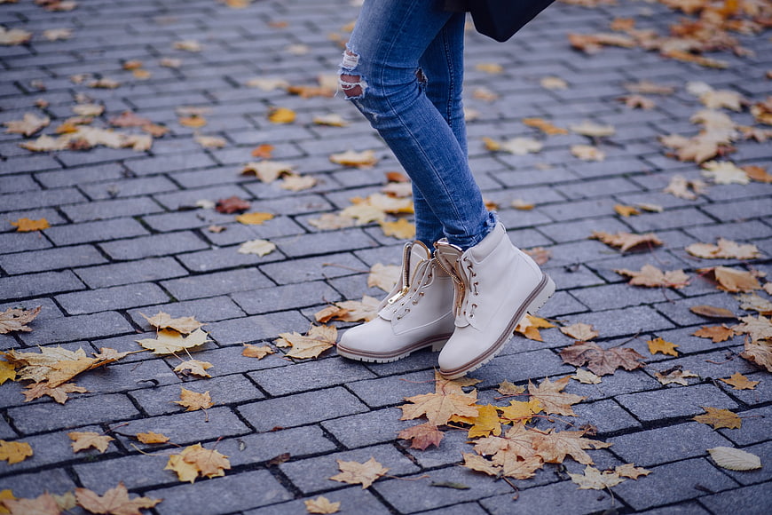 White Boots and Jeans on Autumn Cobblestones