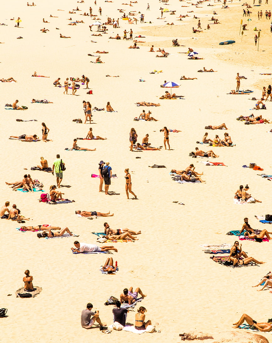 High Angle View of Crowded Sandy Beach with Sunbathers
