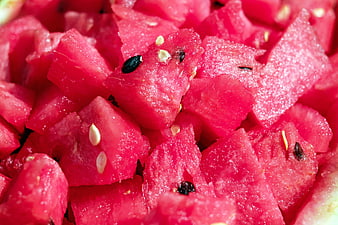 Close-up of fresh diced red watermelon chunks