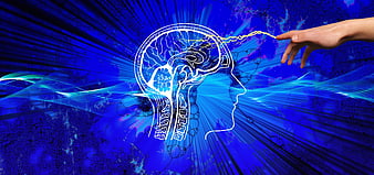 Conceptual illustration of human hand touching glowing brain with electric spark