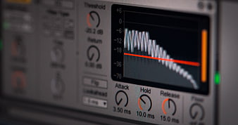Close-up of audio compressor plugin interface on computer screen