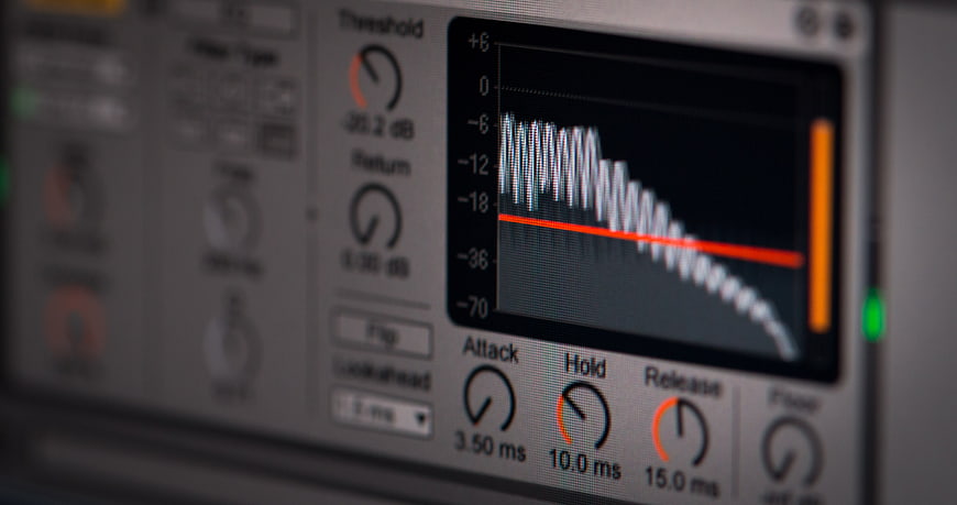 Close-up of audio compressor plugin interface on computer screen