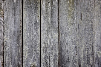 Weathered gray wooden planks texture background