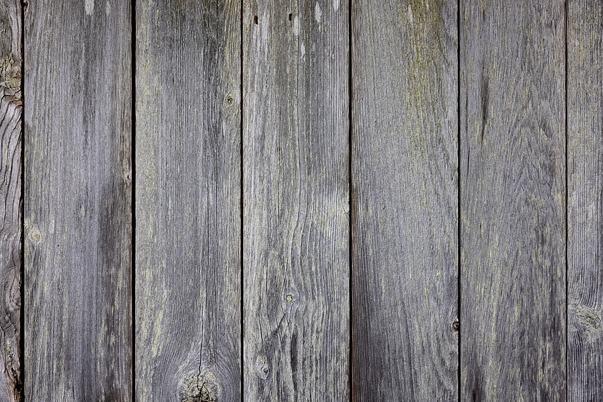 Weathered gray wooden planks texture background