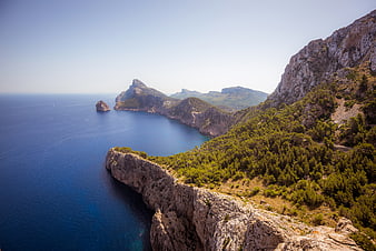 Scenic coastal cliffs overlooking deep blue Mediterranean sea
