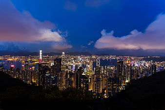 Hong Kong skyline at night with Victoria Harbour and skyscrapers