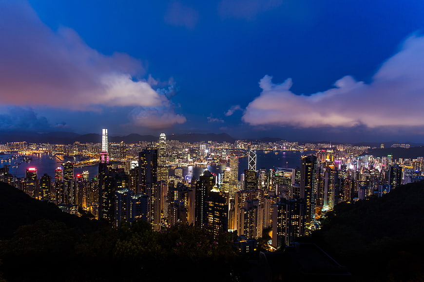 Hong Kong skyline at night with Victoria Harbour and skyscrapers