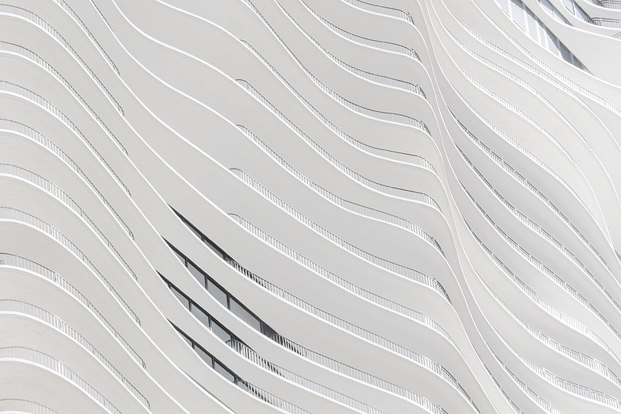 Abstract White Wavy Modern Building Facade Architecture