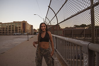 Stylish Woman in Urban Street Setting at Dusk
