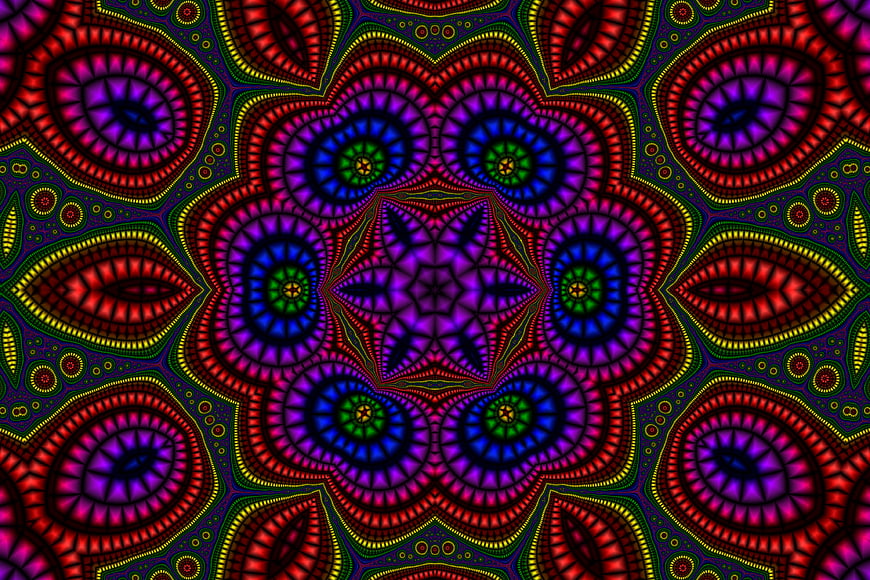 Vibrant multicolor kaleidoscope pattern with symmetrical geometric design
