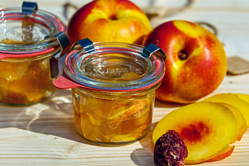 Homemade Nectarine Jam in Glass Jars with Fresh Fruit