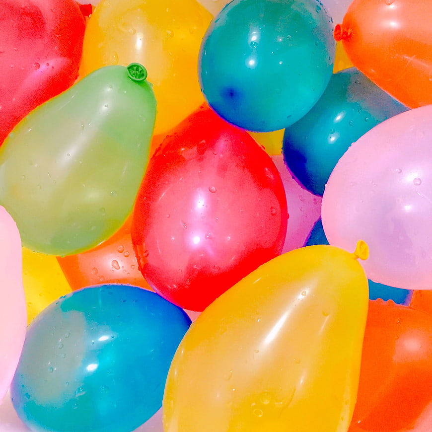 Colorful Wet Water Balloons Close Up With Water Droplets