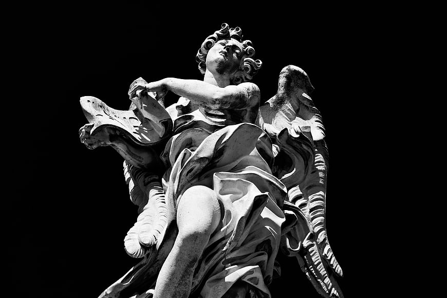 Dramatic Black and White Angel Sculpture