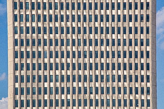 Modern Skyscraper Facade with Vertical Window Pattern