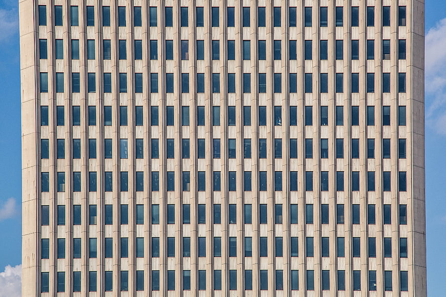 Modern Skyscraper Facade with Vertical Window Pattern