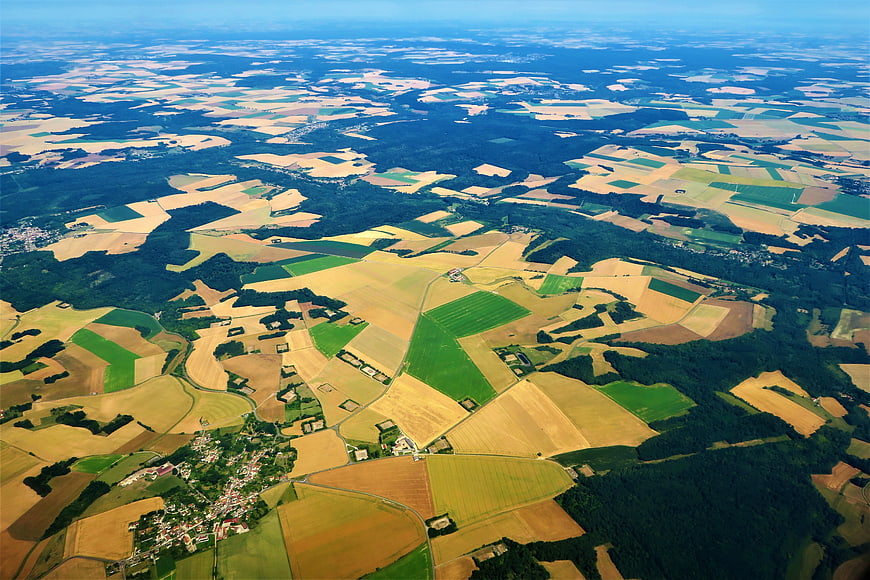 Aerial View of Patchwork Agricultural Fields and Forests