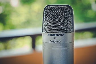 Close-up of Samson C01U Pro Microphone with Green Bokeh Background